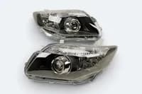 Фары Toyota Corolla Fielder / Axio 141 2006-2015 линзовые темные